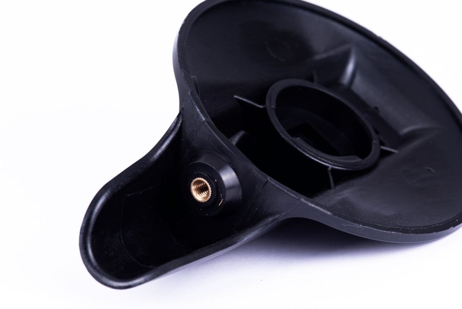 Overmolding of an ABS part